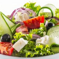 Mediterranean Salad · Fresh salad tossed with crisp romaine lettuce, feta cheese, sun dried tomatoes, artichoke he...