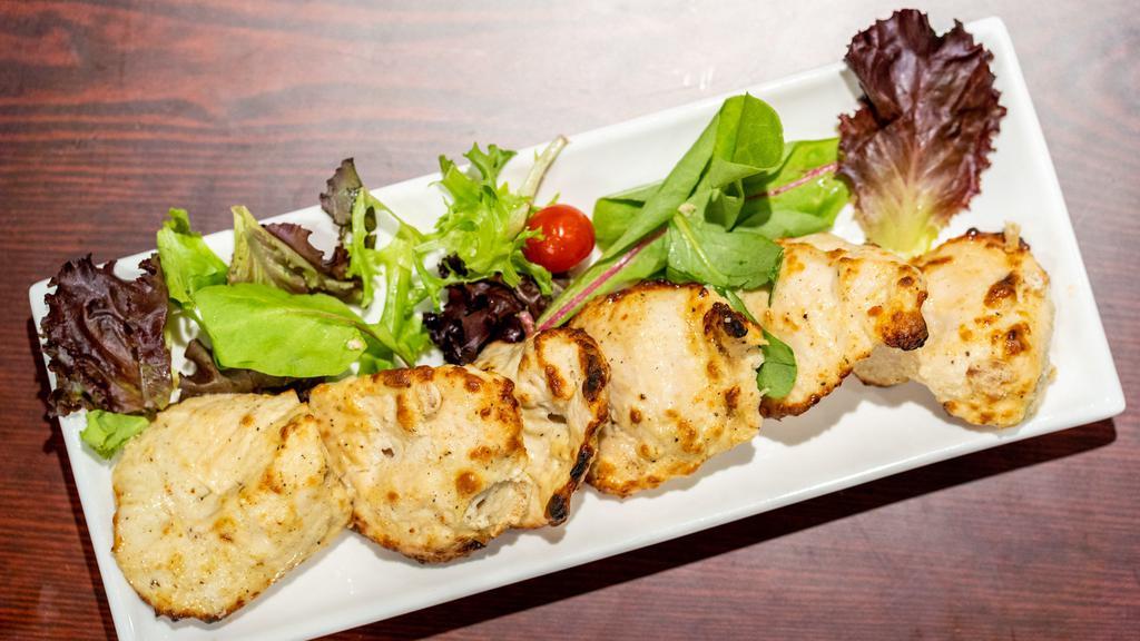 Malai Chicken · Nuts. Boneless chicken marinated in almond, white cashew pastes crushed pepper grilled in clay oven.