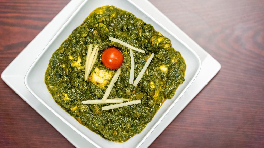 Saag Paneer · Spinach and cottage cheese cooked with herbs.