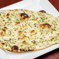 Garlic Naan · White flour bread topped with garlic and butter