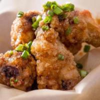 Mighty Wings (5) · Gluten free. Nuts. Potato starch coated wings, sweet ginger sauce, sesame seeds, scallion.