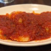 Ravioli Toscana · Homemade four cheese ravioli pecorino Romano, reggiano parmesean, mozaarella, and ricotta in...