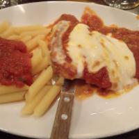 Spaghettini Con Polpetta · Thin spaghetti with tomato basil and meatballs.