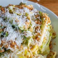 Caesar Salad · Baby gem lettuces, parmigiano-reggiano, crumbled croutons