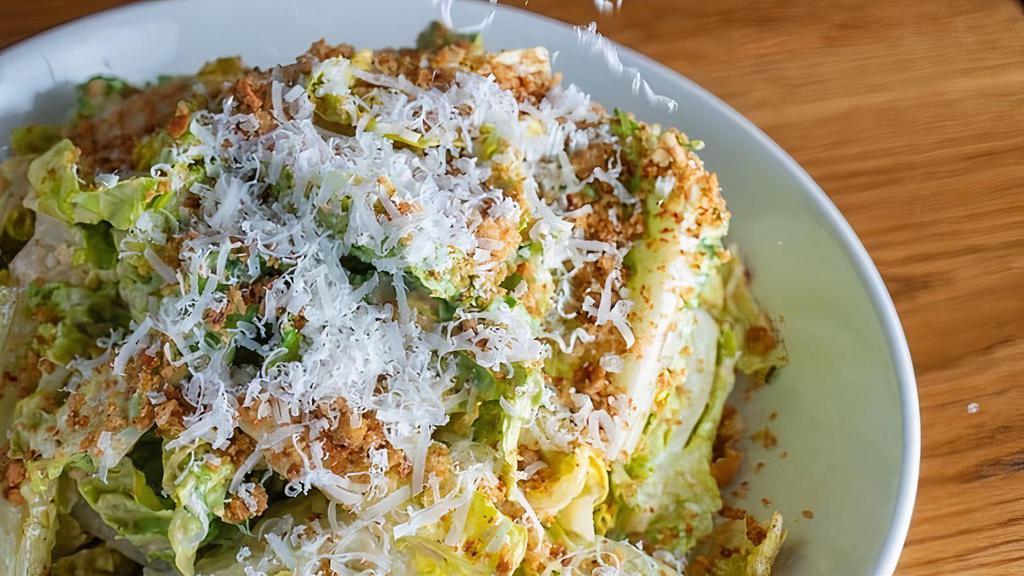 Caesar Salad · Baby gem lettuces, parmigiano-reggiano, crumbled croutons
