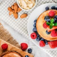 Buttermilk Pancakes With Mixed Berries · Delicious Buttermilk pancakes, served hot off the griddle. Topped with fresh mixed berries, ...