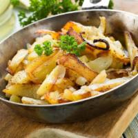 Home Fries · Fresh-cut potatoes, seasoned with house spices and fried.