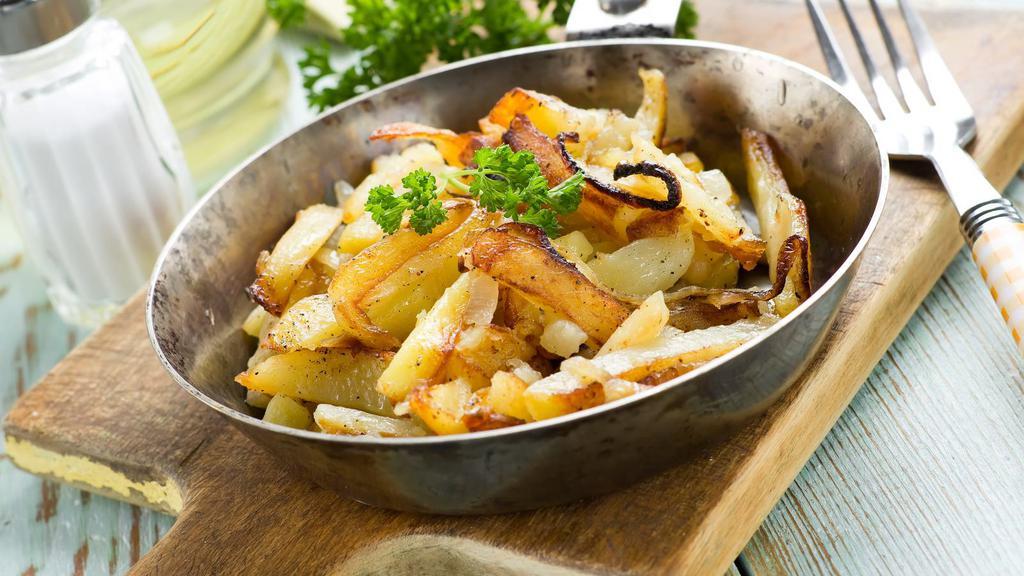 Home Fries · Fresh-cut potatoes, seasoned with house spices and fried.