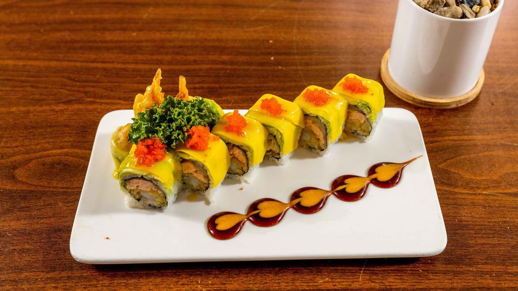 Lover Roll · Eight pieces. Shrimp tempura and salmon tempura inside. Mango, avocado, masago on top with eel sauce and miso sauce.