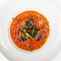 Bagara Baingan · Medium spicy. Baby eggplant cooked in chef's special sauce bringing out a unique flavors.
