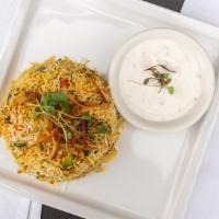 Vegetables Biryani · Medium spicy. Saffron basmati rice and vegetable cooked in a traditional way. Very popular i...