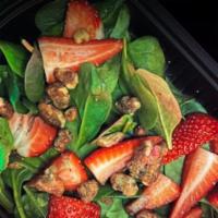 Berry Berry Good Salad · Fresh spinach, walnuts, craisins, strawberries, crumbled feta, raspberry vinaigrette.