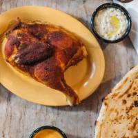 Chicken Muhamar (Roasted Chicken) · (Half) Chicken, seasoned with hadramout's imported seasoning, and slow-roasted to perfection...