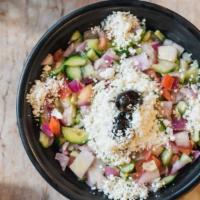 Shepherd Salad · Fresh tomatoes, cucumbers, red-onions, topped with black olives, seasoned with our unique bl...