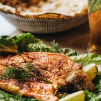 Trout · Grilled open boneless-trout, seasoned with hadramout's special spices. Served fresh tandoori...