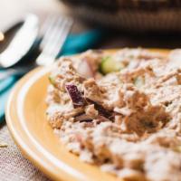 Tuna Salad · Quality yellow-fin tuna, mixed with red onions, scallions, cucumbers, and mayo served with a...
