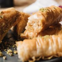 Lady Fingers (3) · Sweet pastry made with extremely thin sheet of phyllo dough layered and rolled with honey sy...