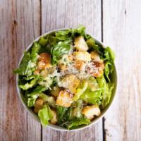 Caesar Salad · Fresh salad made with Romaine lettuce, sliced Romano cheese and homemade garlic roasted crou...
