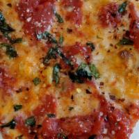 Margherita Pizza · Plum tomato, basil and fresh mozzarella