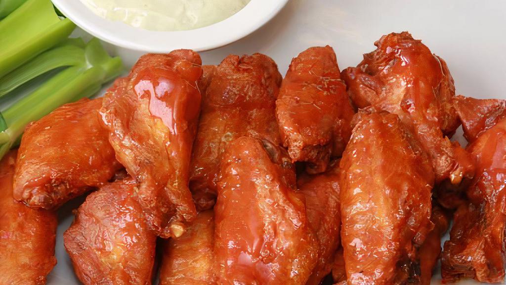 Traditional Wings (20 Pieces) · Anchor Bar's - Home of the Original Buffalo Chicken Wing served with traditional celery and bleu cheese, just like Mother served us that famous night in 1964.  Shaken in your choice of sauce or rub.