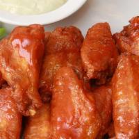 Traditional Wings (10 Pieces) · Anchor Bar's - Home of the Original Buffalo Chicken Wing served with traditional celery and ...