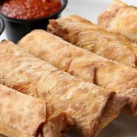 Pizza Logs (3 Pieces) · A Buffalo tradition that we want to share with the rest of the world.  Egg roll wraps stuffe...