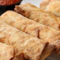Pizza Logs (5 Pieces) · A Buffalo tradition that we want to share with the rest of the world.  Egg roll wraps stuffe...