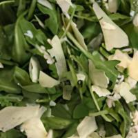 Arugula Salad · Shaved Parmigiano, olive oil, fresh lemon wedges.