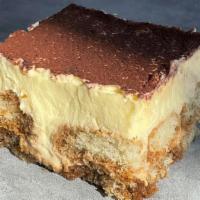 Tiramisu (Dolci) · Made with base of sponge cake, moistened in coffee, cream based on eggs, with cocoa powder o...