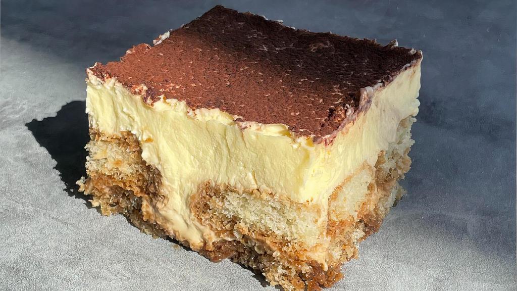 Tiramisu (Dolci) · Made with base of sponge cake, moistened in coffee, cream based on eggs, with cocoa powder on the top.
