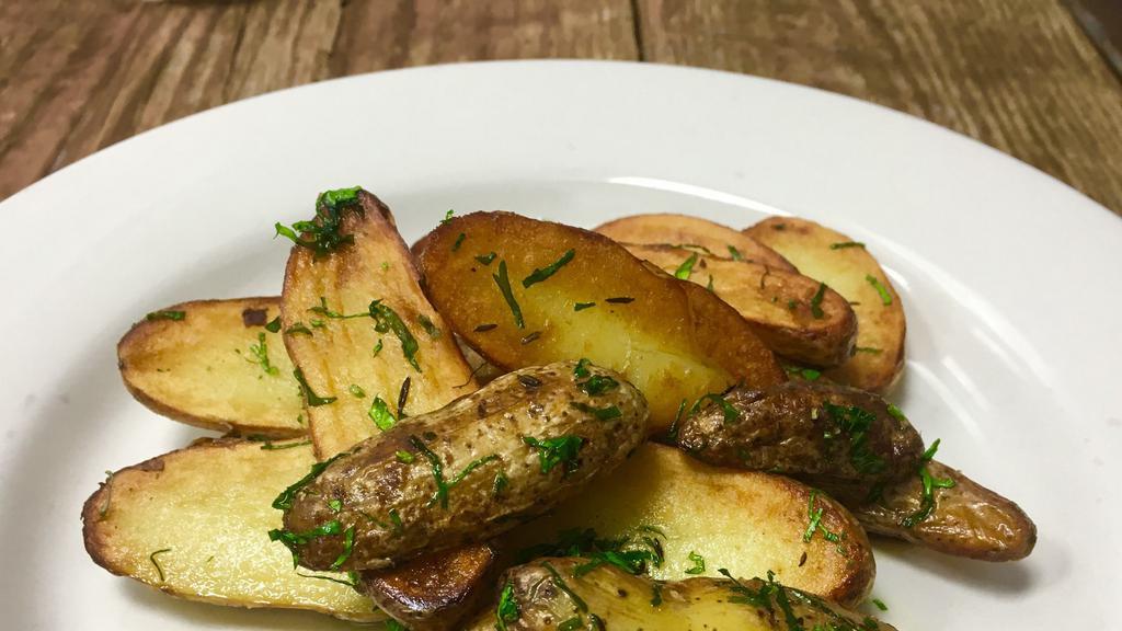 Patate Novelle (Gf) · Vegetarian, gluten free. Roasted fingerling potatoes, garlic butter