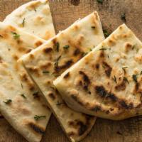 Greek Pita Bread · 2 pieces of our fresh made Greek pita bread. Goes well with our dips!