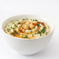 Greek Hummus · Delicious creamy chickpeas seasoned with Greek spices. Goes excellent with our homemade pita.