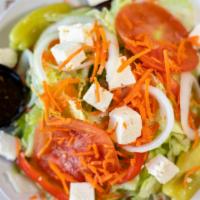 Greek Salad  · Romaine lettuce, tomatoes, cucumbers, onions, olives, and fresh imported Greek feta cheese.