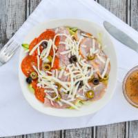 Antipasto Salad  · Romaine lettuce, tomatoes, cucumbers, onions, olives, topped with Prosciutto di Parma, ham, ...