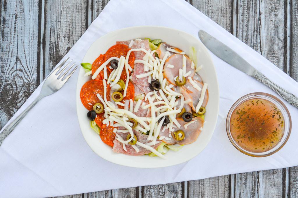 Antipasto Salad  · Romaine lettuce, tomatoes, cucumbers, onions, olives, topped with Prosciutto di Parma, ham, salami, provolone, cheese and roasted peppers.