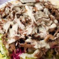 Shawarma Plate · Marinated beef and lamb stacked on a vertical split.