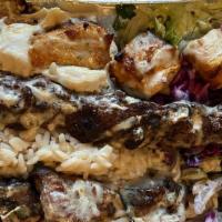 Mix Grill Plate · Lamb kabab, shish Tawook, and kafta.