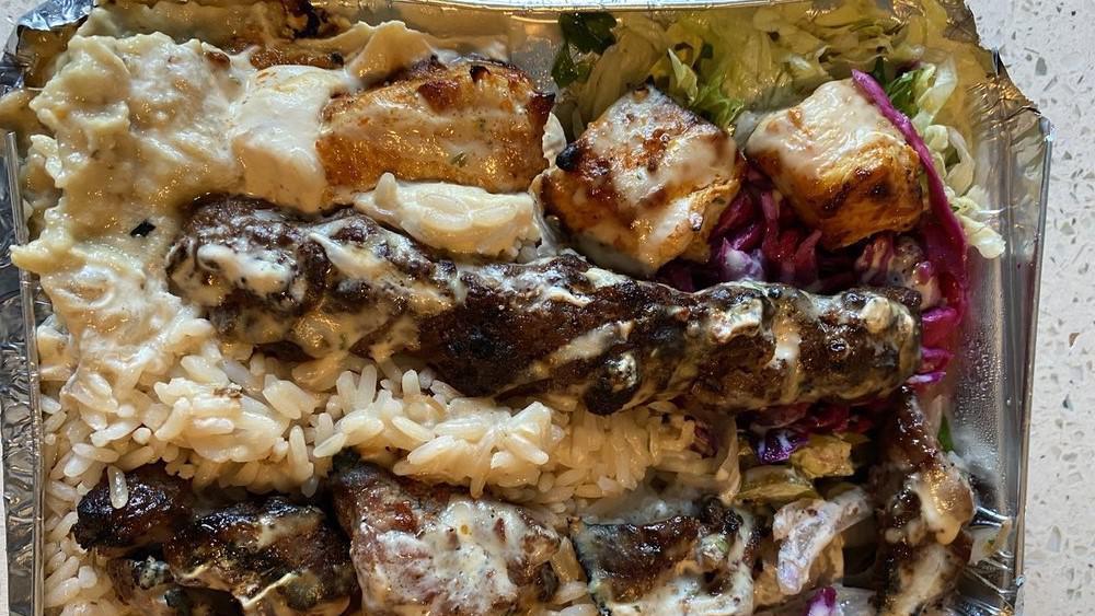Mix Grill Plate · Lamb kabab, shish Tawook, and kafta.