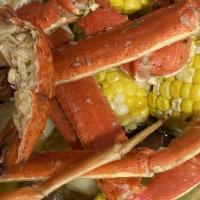 Boil Bag · Snow crab legs, shrimp, mussels, clams, calamari, scallops, corn and potatoes.
