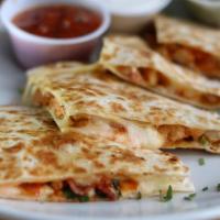 Fajita Quesadilla · Flour tortilla with your choice of steak, chicken slices or chorizo with bell peppers, onion...
