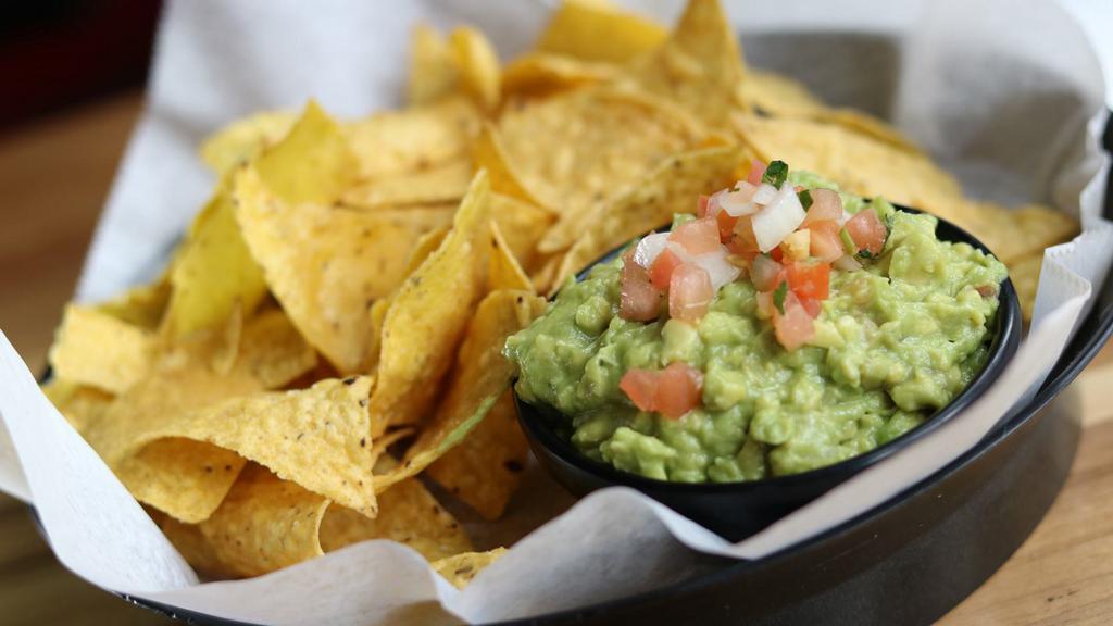 Guacamole Azteca · Diced fresh avocados mixed with onions tomatoes cilantro, jalapeño peppers and lime.