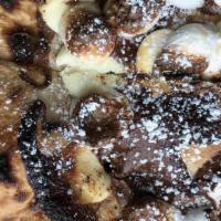 S'Mores Pizza · nutella, crushed graham cracker, marshmallow, chocolate drizzle