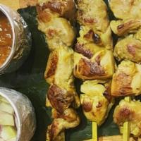 Gai Satay (Satay Chicken) · Grilled free-range chicken in skewers marinated with lemongrass, turmeric, coriander, served...