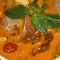 Kaeng Phed Ped Yang (Duck Breast) · Spicy. Roasted duck breast simmered in red curry paste with coconut milk, Thai baby eggplant...