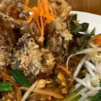 Chanthaburi Pad Thai · Crispy soft shell crab, chives, preserved radish, brown bean curd, egg.
Add lump crab meat f...