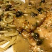 Chicken Picatta With Linguine · Sautéed chicken, capers, lemon sauce, served over linguine.