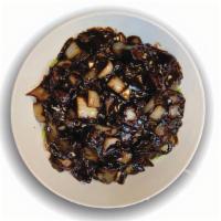 짜장면 Jajangmyeon · Noodles and pork meat with with Chinese black bean sauce.