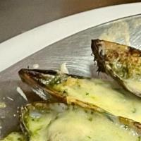 Gratinated Mussels (6) · New-Zealand Green Lipped Mussels , Parsley-Garlic Butter , Gruyere.