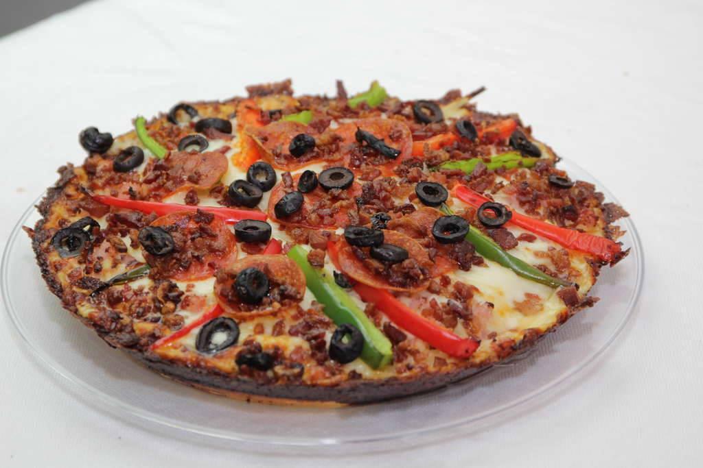 Delicias Pizzeria · Pizza · Sandwiches